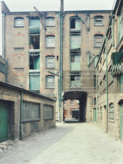Bermondsey Street, the rear yard of Tempo Leather Company Limited warehouse.  X.png