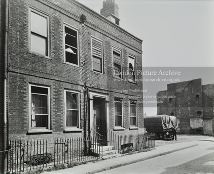 East Lane, Bermondsey, No.89. Derelict house with an army van on the right 1947. X.png