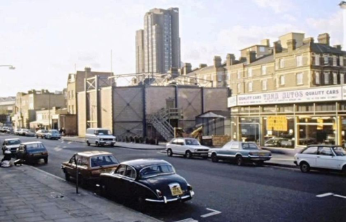 The Cut, c1978. Looking at The Young Vic theatre with Union Jack Club tower behind it, right is the Peabody Trust Flats in Cons Street. Pic 1. X.png