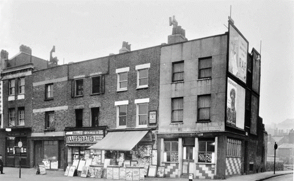 London Road, c1953, left is Conquest Street which is no longer there. The pub to the left is Old Queens Head. X.png