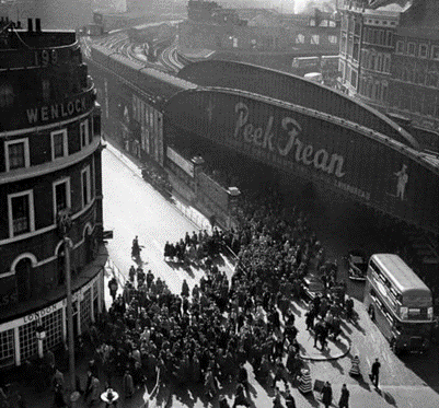 Borough High Street, London Bridge Pub left, junction with Tooley Street.  X.png