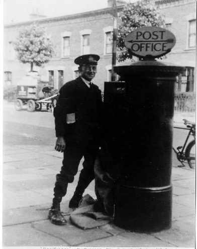 Debnams Road, the Postman. The Post Office was on the corner of Debnams Road and Rotherhithe New Road. X.png