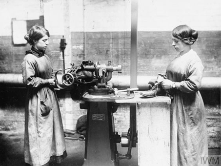 Old Kent Road 1917. Female workers operating machinery and waist levelling at the Army Boot Repairing Factory RACD.  X..png