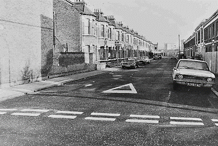 Cowan Street looking towards Jardin Street. The derelict Watkin's Bible factory can just be seen on the right.   X..png