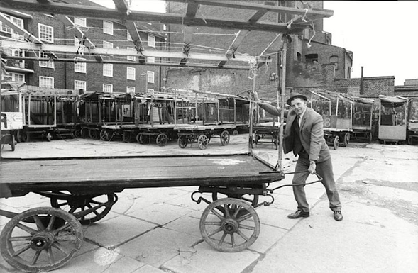 East Street Market. Arthur Delimore pulling the stalls back to the yard.  X..png