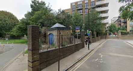 Swan Road, Albatross Way left pass the lamp post. The small building looks nothing like the Fire Engine House in the picture, so maybe the building is in the trees.  X..png