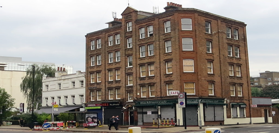 Blackfriars Road, Pre-demolition St George's Mansions closed down Summer 2013.  The white building was The Old Kings Head Pub, Pocock Street to the right.   X..png