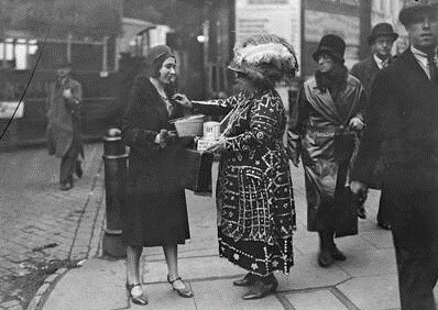 Mrs P Ramswell, the original  Pearly Queen of Southwark, collecting for the blind at London Bridge Station c1932.  1  X..jpg