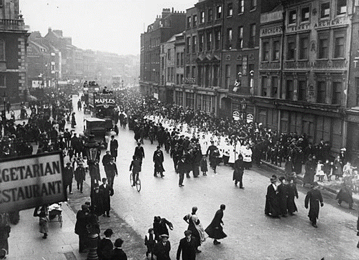 Borough High Street, c1912. A religious procession passes through Southwark on Good Friday. H. Archer Tobacco Co on. Right.   X..png