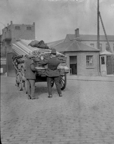 Surrey Commercial Docks. Dock police examining outgoing cart at dock gate, c1926.  X..png