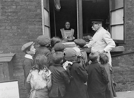 Bermondsey 1917, subsidized Food. Children queuing up for penny meals from a soup kitchen.  X..png
