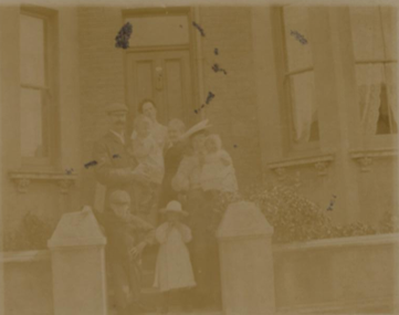 St George's Way formally St Georges Road c1906. Mrs Sims outside number 243.  1   X..png