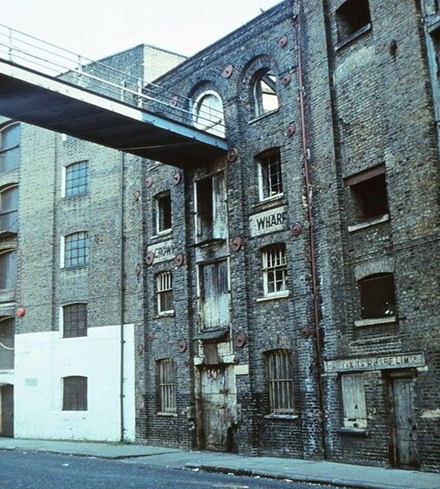 Shad Thames, Crown Wharf, 1981. Hamlyn’s Wharf was left of bridge, St Andrews Wharf right (in c1900).  X.png