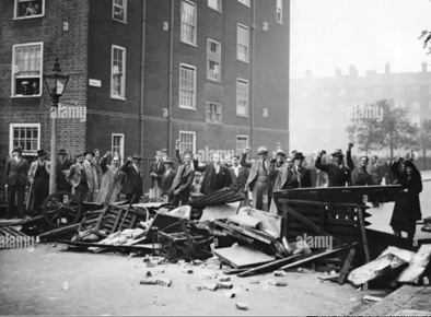 Pilgrimage Street, Demonstrators have erected a barricade to prevent the march of the British Union of Fascists led by Oswald Mosley through South London, 03-10-1937. X..png