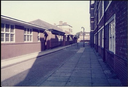 Derrick Street, Redriff Estate, Old community centre left, Fidgetts Pub at the far end, Gulliver Street behind.  X..jpg