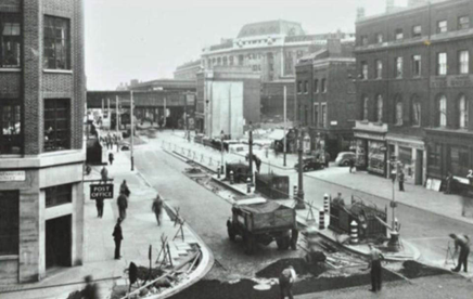 4. Waterloo Road, Stamford Street left, Boyce Street on right with cars and Waterloo Station c1950.  X.png