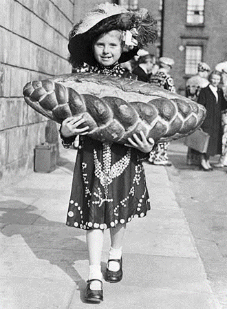 1.  Old Kent Road, St. Mary Magdalen Church 1951, seven-year-old Mavis Hughes, pearly princess of Acton, arrives for the Costers' Harvest Thanksgiving service.  X..png