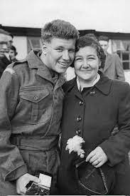 Druid Street, George with his mum Arnold Estate, Druid Street, 1953.  X..png