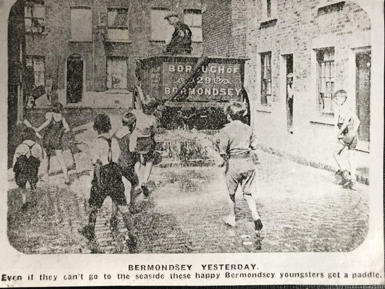 3. Charlie Pauly is  the little boy in the middle at the back, his sister Betty is the little girl at the front, c1932. Both lived in Pages Walk.  X..jpg