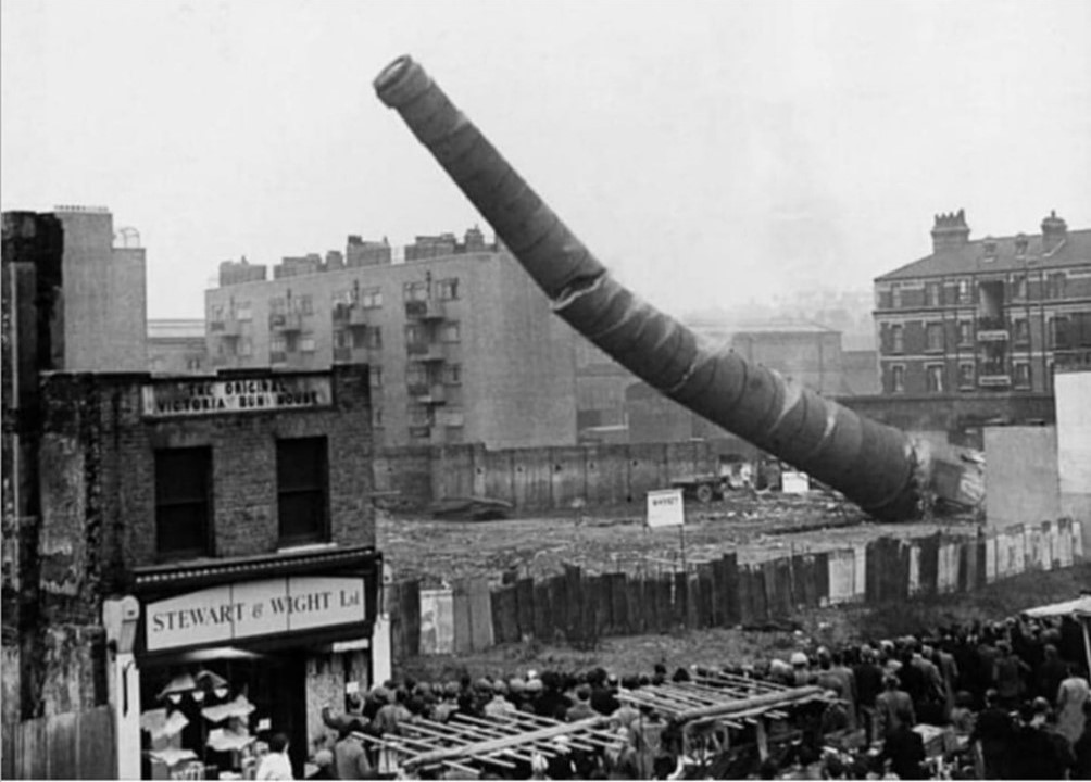 The Cut and Windmill Walk 1951. The massive former boiler house chimney behind the row of shops along the Cut and just off Windmill Walk, standing directly opposite Cons Street. 2. X..jpg