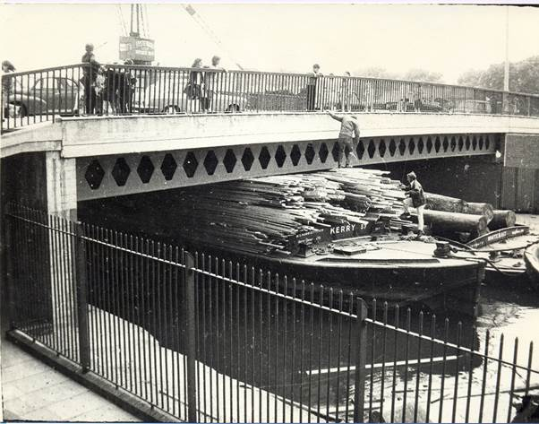 Oxestalls Road, Surrey Canal Bridge, late 1960s. Crane seen in background belonged to Stewards and it was located at their New Baltic Wharf. X..png