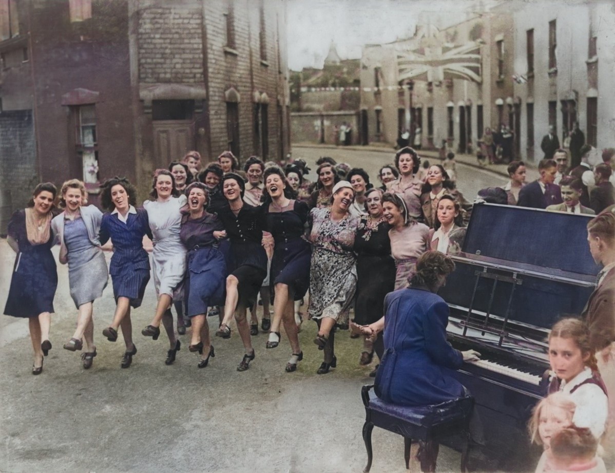 VE Day celebrations in Bermondsey c1945. The young girl  bottom right is 10yr old Sylvia (Hazel) Ash.  X..jpg