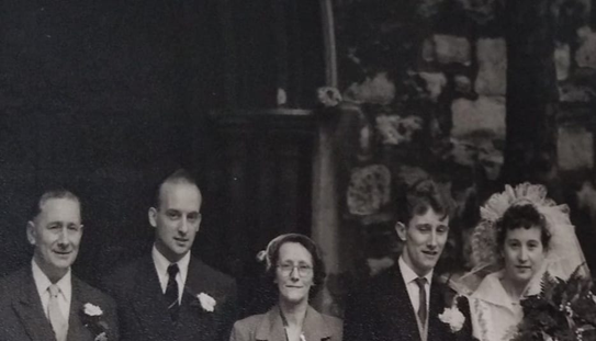 Nursery Row, from left to right, Henry Harry Sage Sr, Henry Harry boy Sage Jr, Louisa Lou-Lou Sage-nee Atkins, John Johnny boy Sage, Daisy Sage-Nee Hance, St John's Church in 1954. X..png