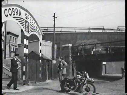 FILM ONCE A JOLLY SWAGMAN 1949. Bill Fox (Dirk Bogarde) The railway line and bridge no longer there, the land to the right is occupied by buildings on John Williams Close. X..png
