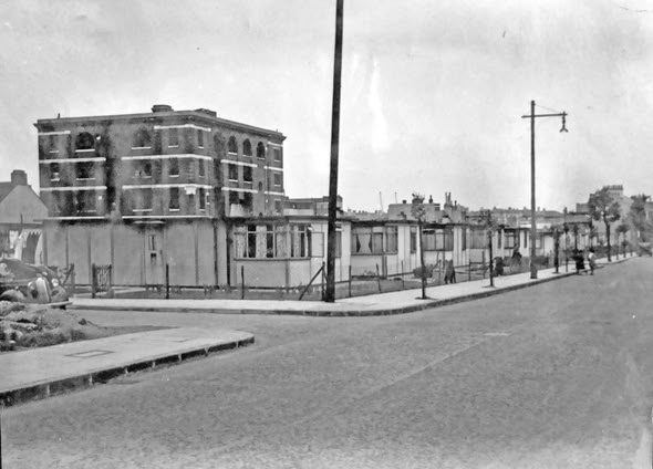 Abbey Street, Riley Road, left, 1950's , the Royal  George Pub down on the Right.   X..png