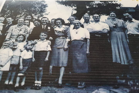 Old Kent Road, wedding reception at number 817, 1949. I believe the brides single name was Ginman and married name Lawrence..png