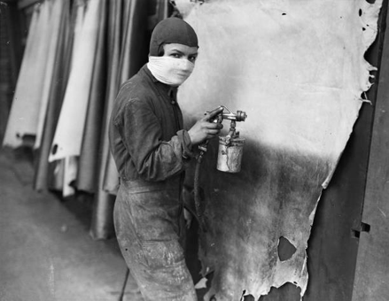 Abbey Street, Bevingtons Leather Factory c1932, worker sprays a hide.  X.png