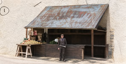 Alexis Street, outside number 9, picture states Bertram Hawkins outside his shop.  X..png