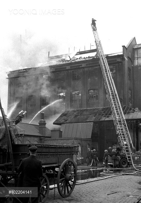 Firefighters attacking a blaze in Bricklayers Arms Goods Depot in the Old Kent Road.jpg