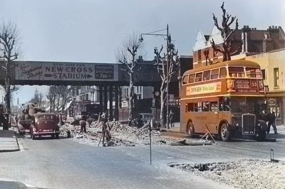 Junction of Pomroy Street and Old Kent Road in 1953. This is New Cross Rd,Old Kent Rd ends the other side of bridge..jpg