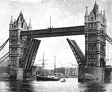 Quest going under Tower Bridge c 1921.jpg