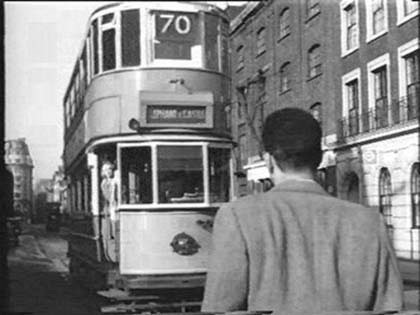 Tooley Street, taken from the film Pool of London 1951.Near Battle Bridge Lane (right).jpg