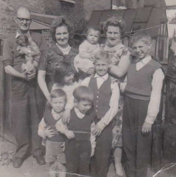 A Family in the back garden of a house in Blue Anchor Lane Bermondsey in 1960.jpg