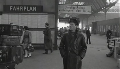 Film, The Password is Courage 1962. London Bridge Railway Station, the heavily disguised, Dirk Bogarde..jpg