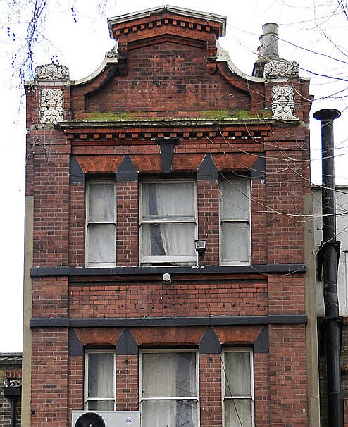 Spa Road, site of  The Rising Sun Pub, name in the brickwork..jpg