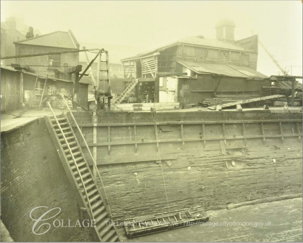 Fountain Dock, Bermondsey Wall East 1929. looking from the south east corner of the dock, towards the river and the direction of the City.   X.png