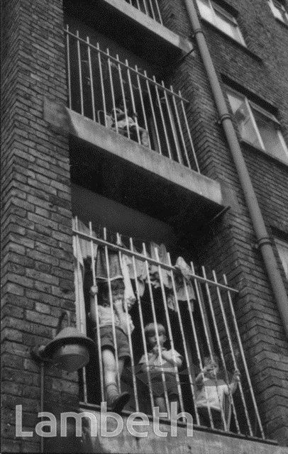 Coin Street, c1955, children on a stairwell of Edward Henry House. X.png