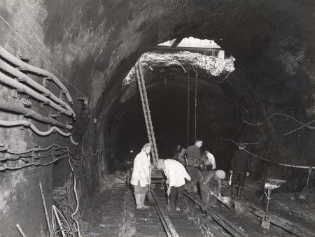 Surrey Docks Underground station, bomb damage on the track,1944. 2  X.png
