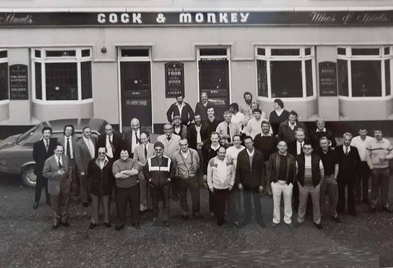 Neptune Street, Rotherhithe in 1987. The Courages Beer Factory Closing Party at the Cock & Monkey Pub.  X.png