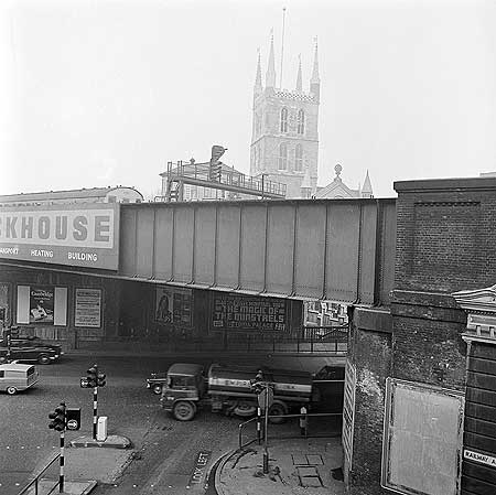 London Bridge Street. The railway line passing over the busy road junction of Railway Approach and Borough High Street.  X.png