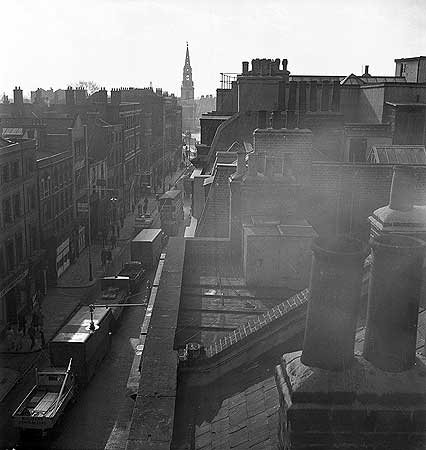 Borough High Street View from a rooftop, looking south along Borough High Street, with the spire of St George's Church in the distance.png