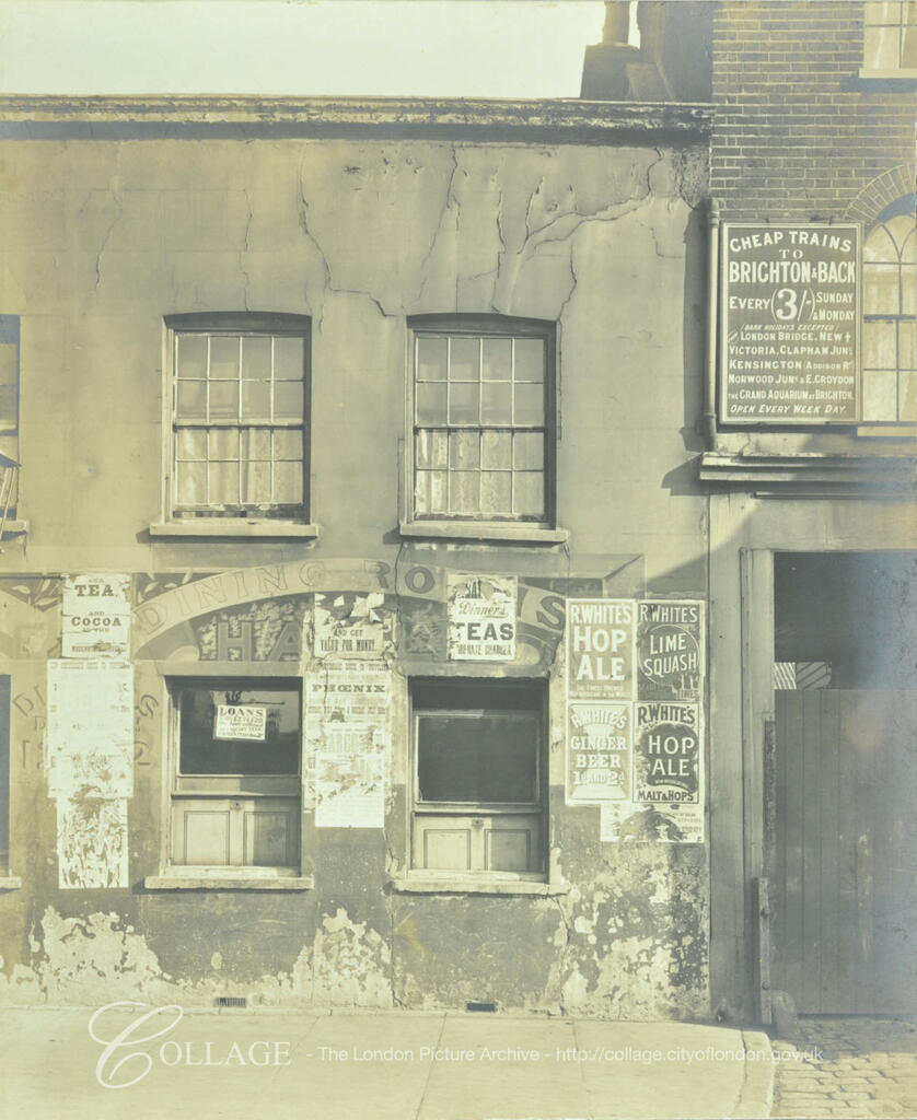 Bermondsey Square, Tower Bridge Road. Posters for Cheap trains to Brighton for 3 shillings, R. White's hop ale, lime squash and ginger beer, c1900. X.png