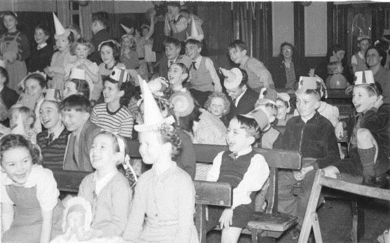 Trundleys Road, Children at the Folkestone Gardens Social Club Christmas Party. Possibly 1954.  X.png