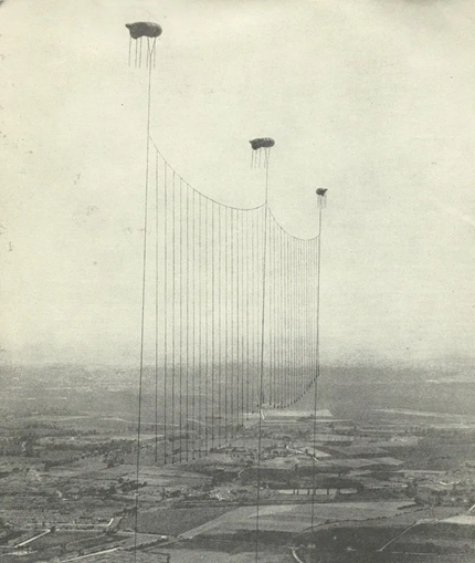 WW1, the balloon apron across the eastern approaches to London, introduced to help against the night raids.   X.png